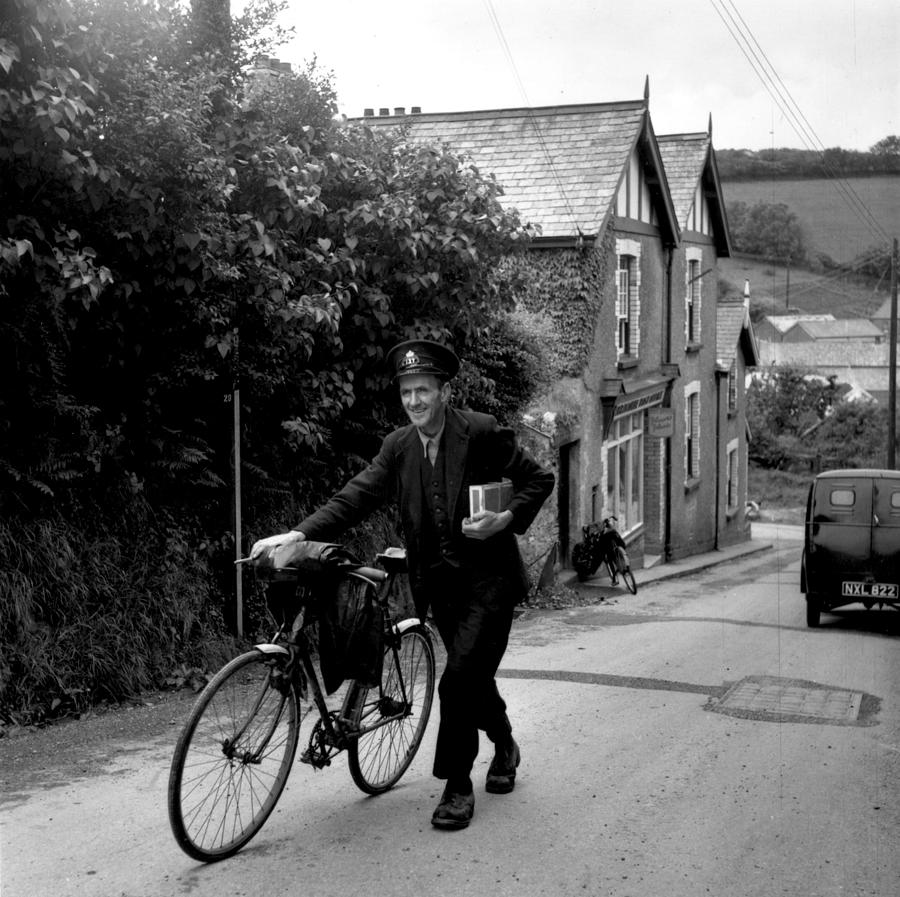 Postman And Bike Photograph by Carl Sutton