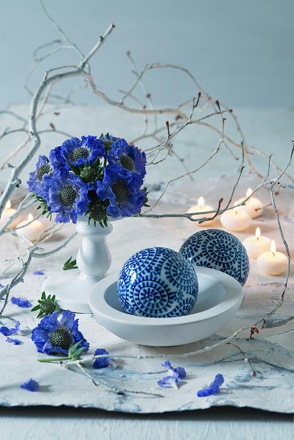 Posy Of Blue Flowers Next To White Branch And Ornamental Spheres Photograph by Alena Hrbkov