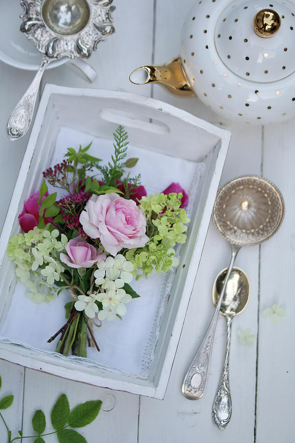 Posy Of Roses, Hydrangeas And Spirea On Wooden Tray Photograph by Angelica Linnhoff