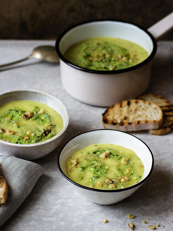 Potato And Leek Cream Soup With Parley Pesto And Walnuts Photograph by Zuzanna Ploch