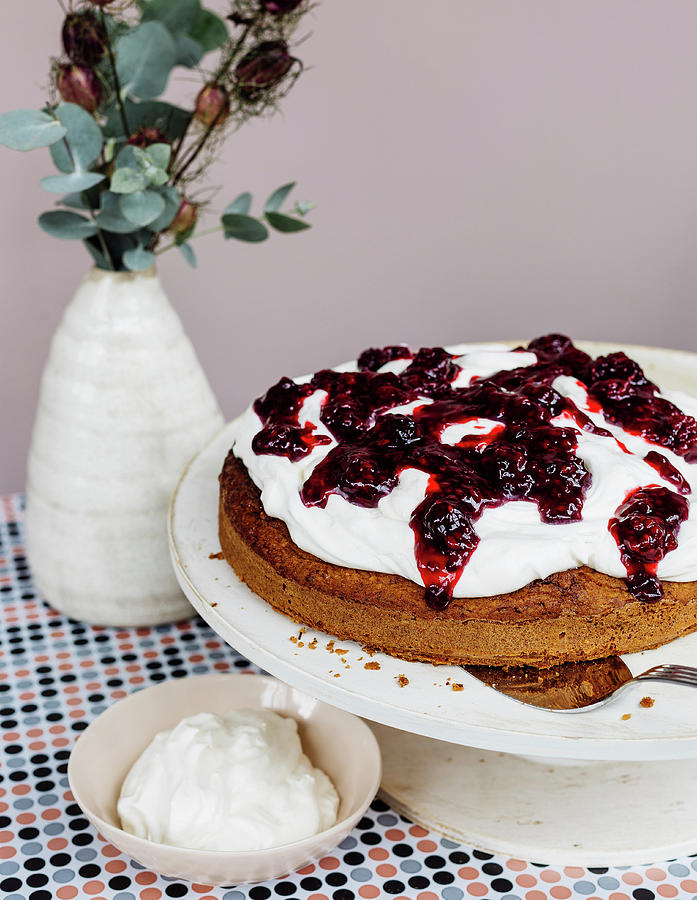 Potato And Nut Cake With Blackberry Sauce Photograph by Anna Haas / Stockfood Studios