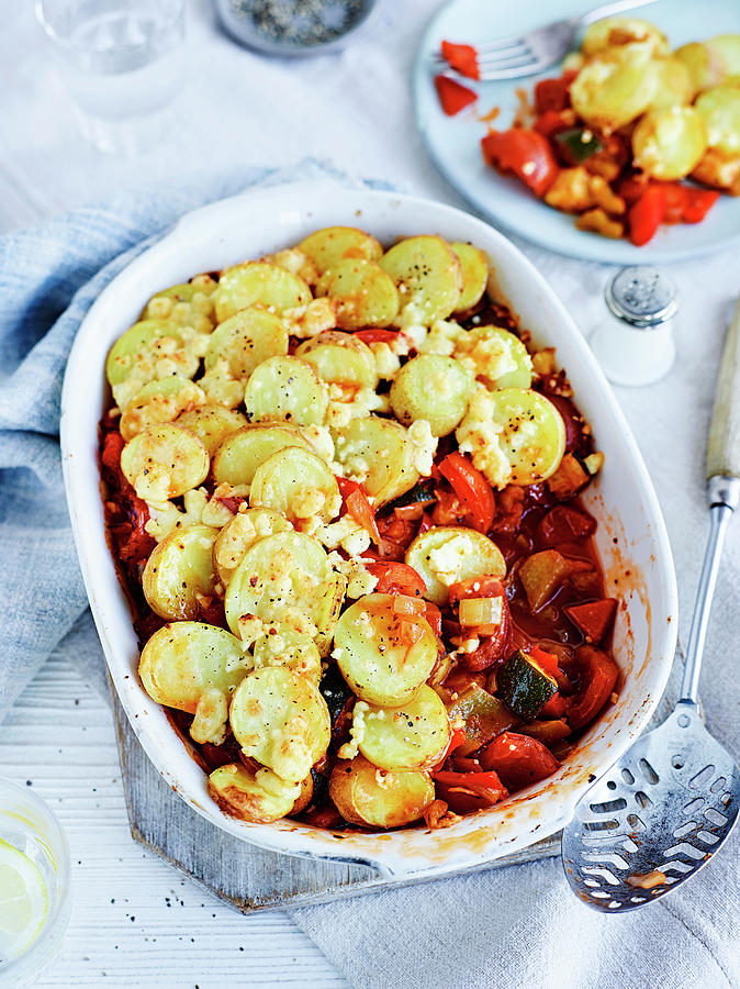 Potato Bake With Vegetables And Cheese Photograph by Charlie Richards ...