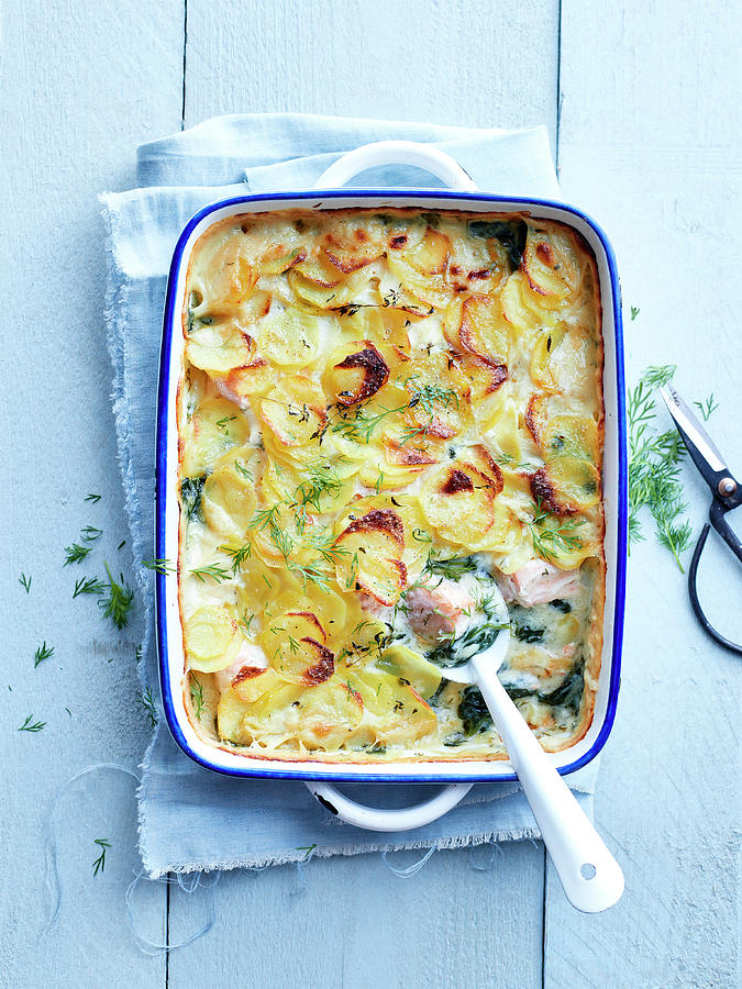 Potato, Salmon, Spinach And Dill Gratin Photograph by Swalens