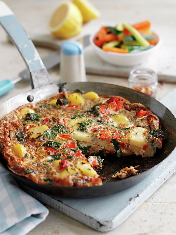 Potato Tortilla With Spinach And Red Peppers Photograph by Gareth Morgans