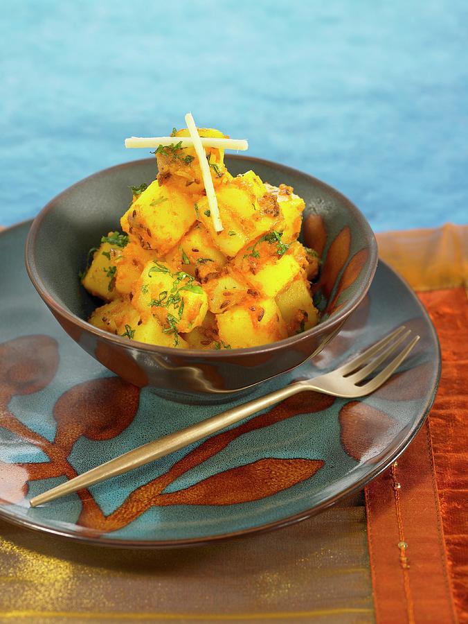 Potatoes With Cumin And Coriander Photograph by Lawton