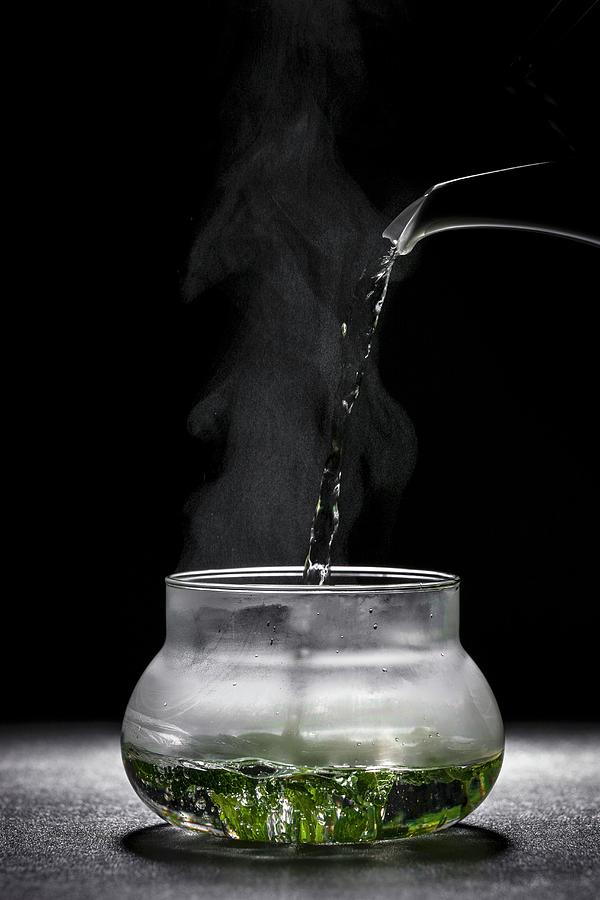 Pouring Soup Into A Glass Bowl Photograph by Younes Stiller