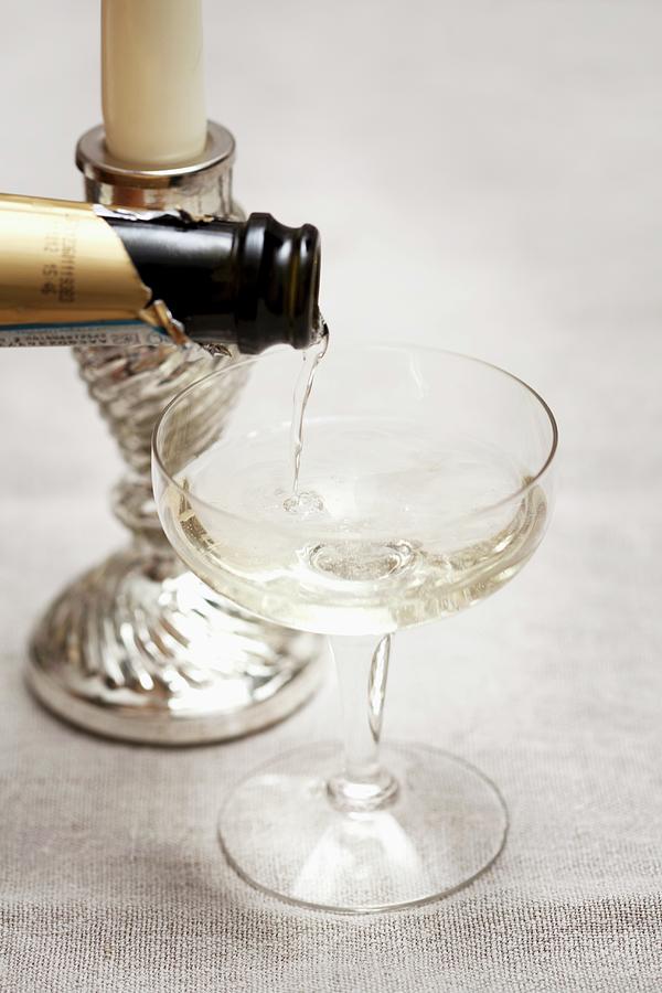 Pouring Sparkling Wine Photograph by Lisa Barber