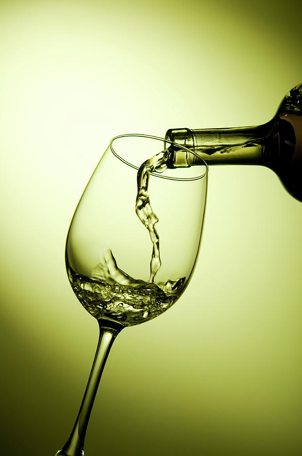 Pouring White Wine Photograph by Carlosalvarez