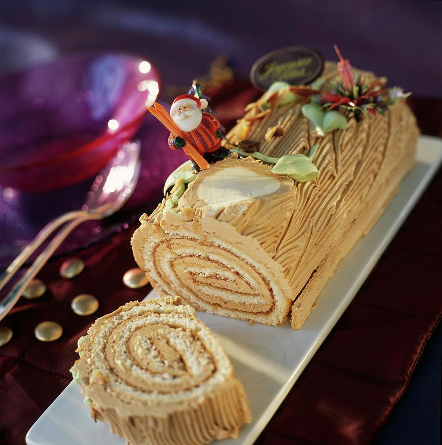 Praline Rolled Christmas Log Cake Photograph by Desgrieux