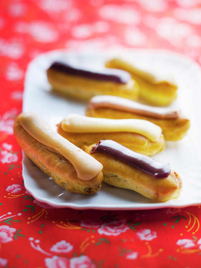 Praline, Toffee, Chocolate And Coffee Mini Eclairs Photograph by Roulier-turiot