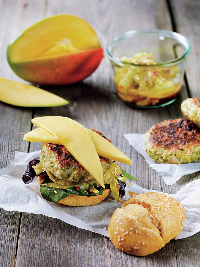 Prawn Burger Made In A Beefer With A Mango, Sesame Seed And Cucumber Salad Photograph by Tre Torri