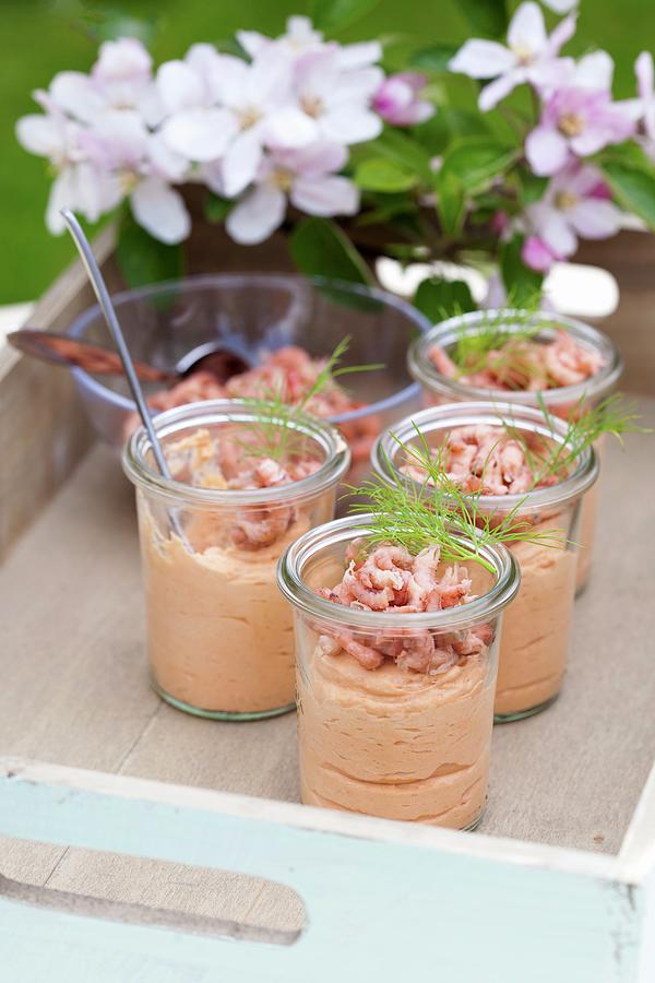 Prawn Mousse In Glasses On A Tray In A Garden Photograph by Jan Wischnewski
