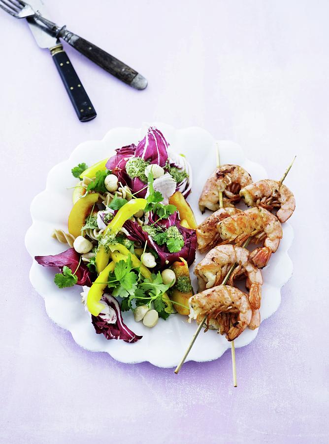 Prawn Skewers With A Pasta Salad Photograph by Mikkel Adsbl