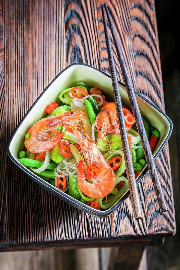 Prawns And Vegetables Served With Rice Noodles thailand Photograph by Shaiith