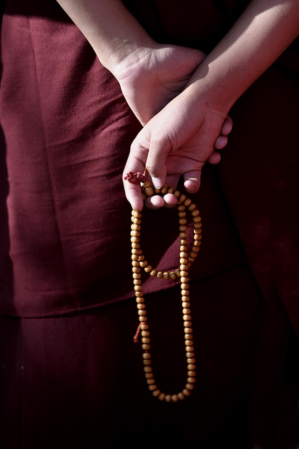 Prayer Beads In The Hands Of A Monk by P wei