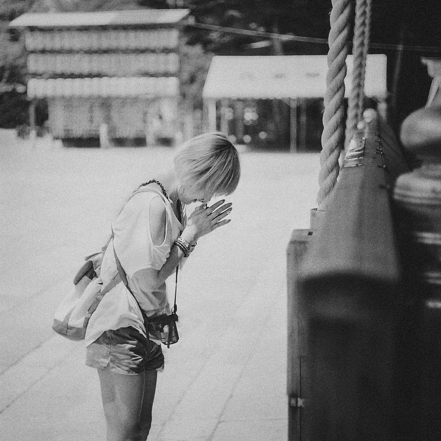 Woman Photograph - Praying At The Shrine by Eiji Yamamoto