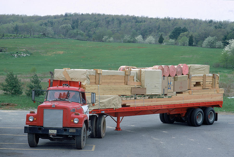Prefab House On A Flatbed Photograph by John Zimmerman