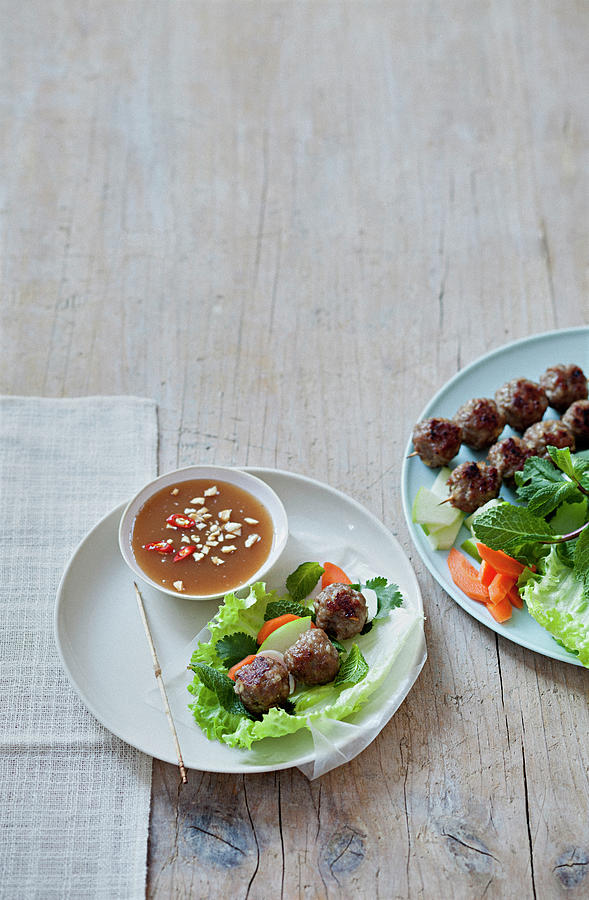Preparing Spring Rolls With Rice Galettes,lettuce And Meatballs,spicy Peanut Sauce Photograph by Japy