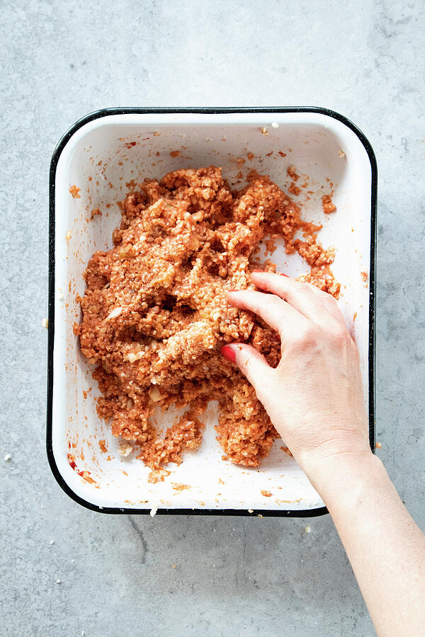 Onion Photograph - Preparing Vegan mett From Rice Wafers, Tomato Puree, Onions And Spices by Simone Neufing