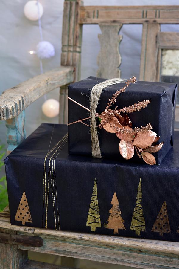 Presents Wrapped With Tissue Paper And Metallic Decorations Photograph by Great Stock!