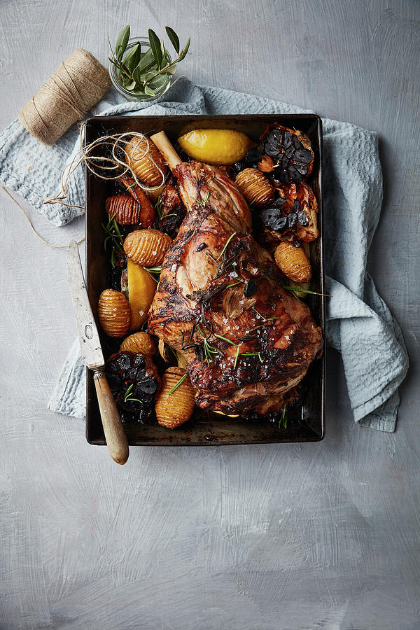 Preserved Lemon, Rosemary And Garlic Roasted Lamb With Baby Hasselback Potatoes Photograph by Great Stock!