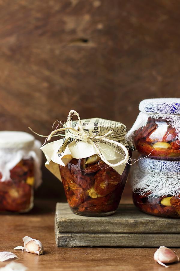 Preserved Tomatoes With Garlic Photograph by Zuzanna Ploch