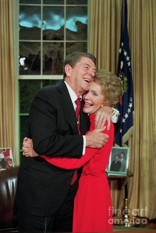 President And Nancy Reagan Hugging Photograph by Bettmann