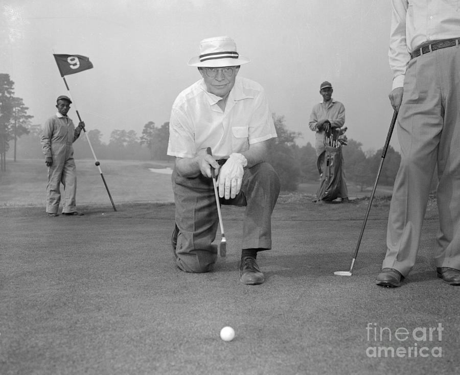 President Eisenhower Playing Golf Photograph by Bettmann