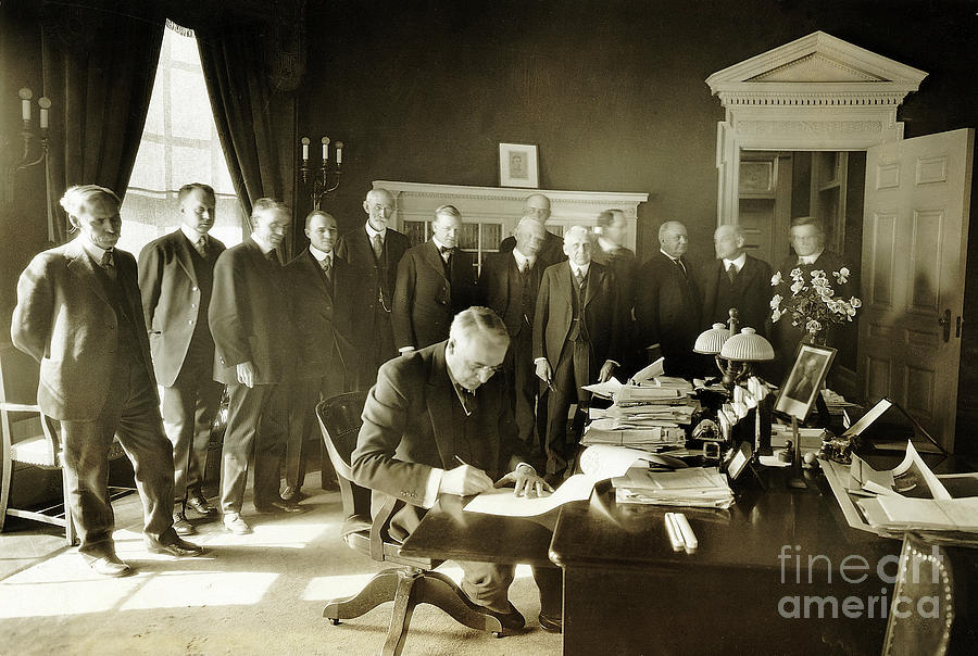 President Harding Signing Photograph by Bettmann