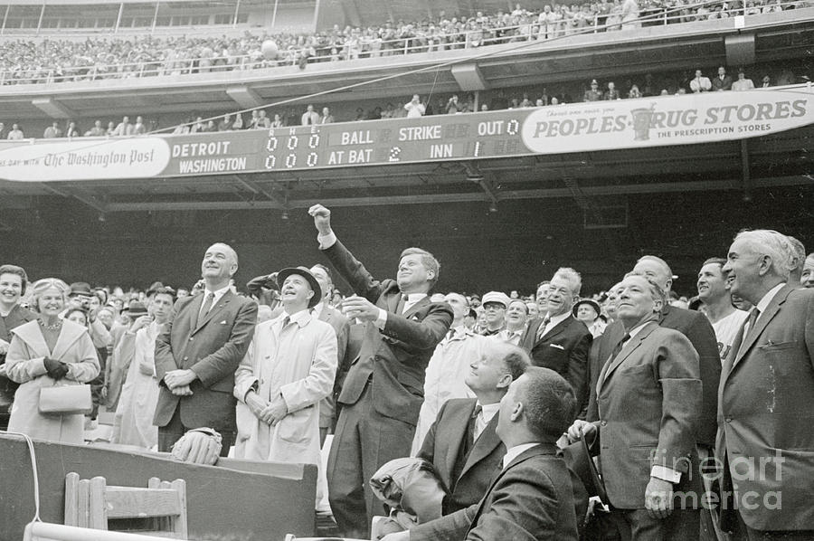 President Kennedy Tossing Out First Photograph by Bettmann
