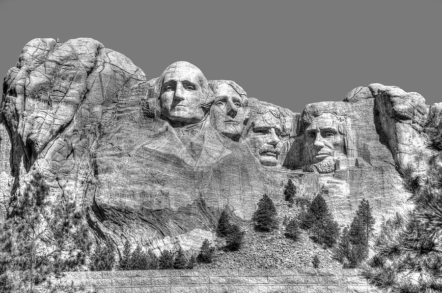 Presidential portraits carved into granite at Mount Rushmore  Photograph by Dan Friend