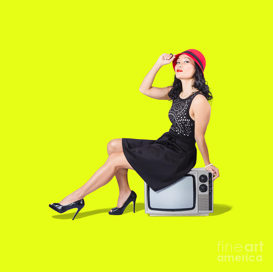 Pretty pinup woman sitting on 70s tv set Photograph by Jorgo Photography