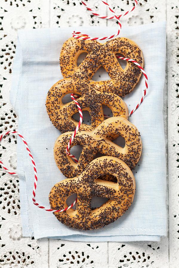 Pretzels With Poppy Seeds On A String Photograph by Rua Castilho