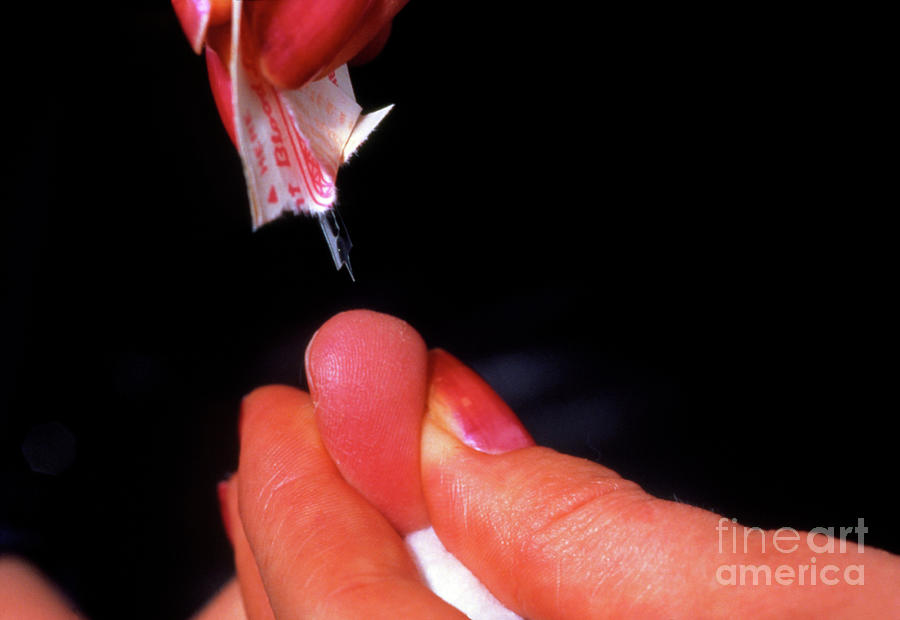 Blood Testing Photograph - Pricking The Finger To Release Blood Sample by Science Photo Library