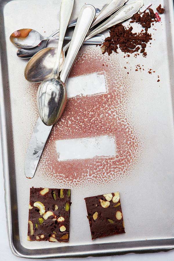 Prints From Ice Cream Desserts On A Baking Tray With Chocolate Cake And Cutlery Photograph by Magnus Carlsson