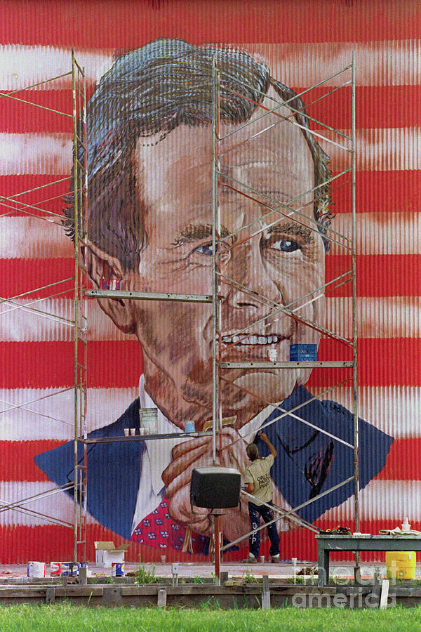 Prisoner Painting Mural Of George Bush Photograph by Bettmann