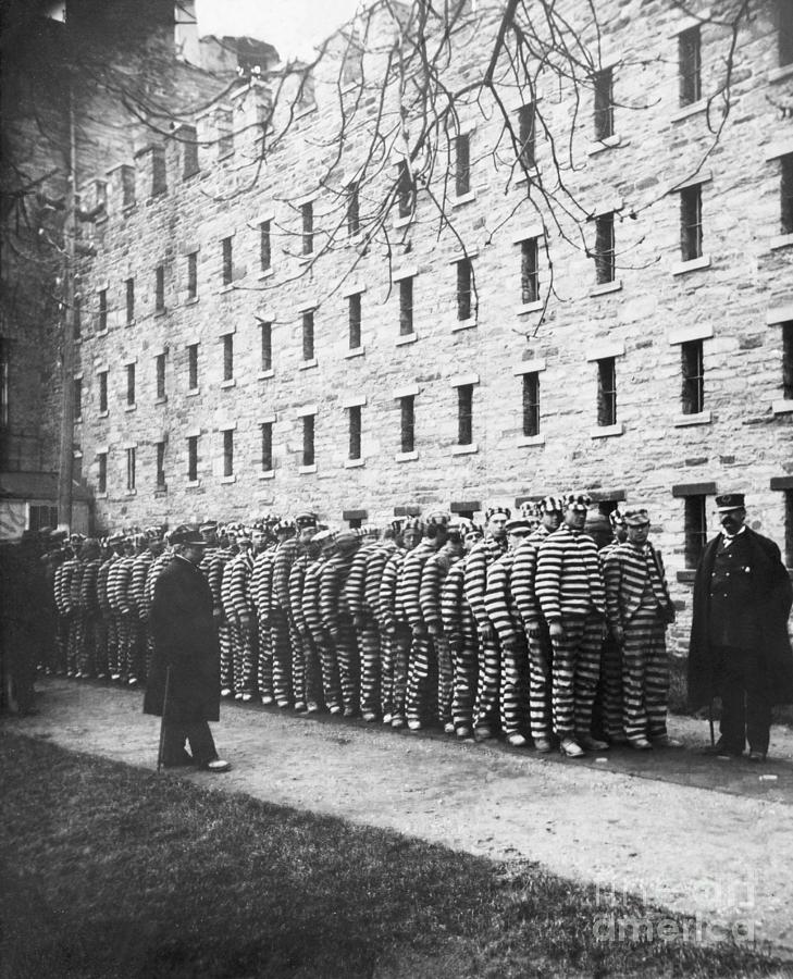 Prisoners Lined Up In Striped Uniforms Photograph by Bettmann
