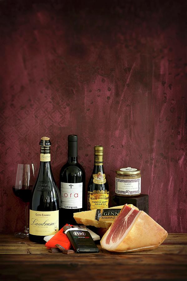 Products From The Emilia Romagna Region: Wine, Ham, Chocolate, Cheese, Honey Photograph by Jalag / Michael Bernhardi