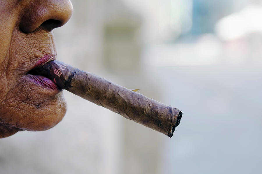 Profile Of Cuban Woman Smoking Cigar In Photograph by Christian Aslund Profile Of Cuban Woman Smoking Cigar In Photograph by Christian Aslund