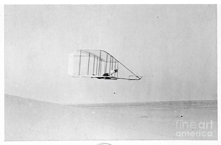Profile View Of Early Airplane Flying Photograph by Bettmann