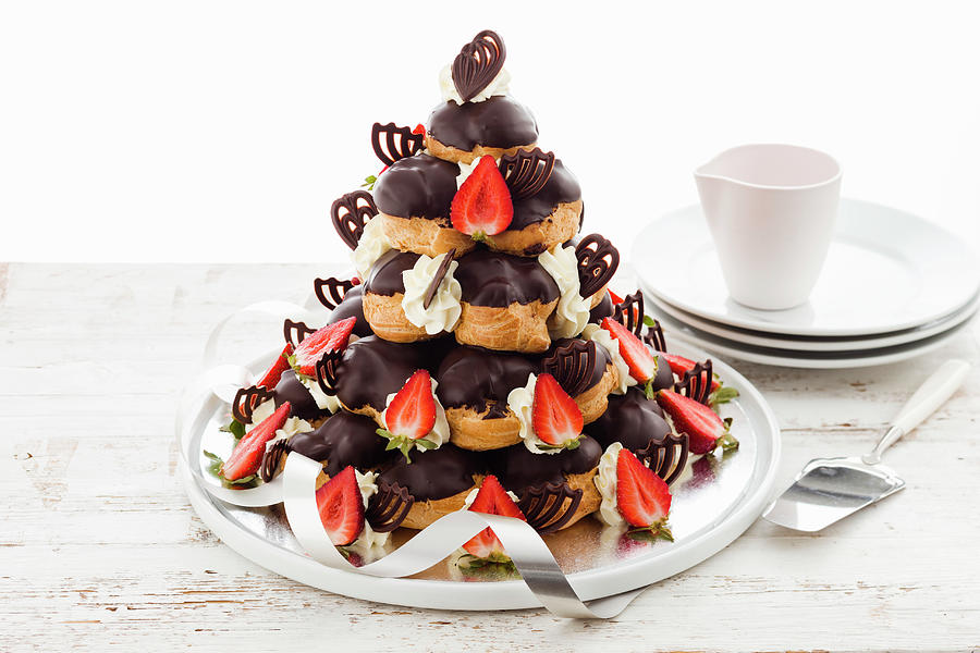 Profiterole Pyramid Cake With Strawberries Photograph by Andrew Young