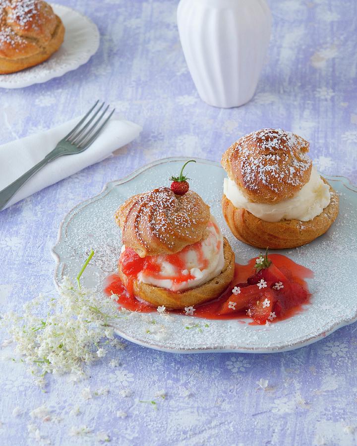 Profiteroles With Vanilla Ice Cream, Strawberry And Rhubarb Compote And Elderflowers Photograph by Udo Einenkel
