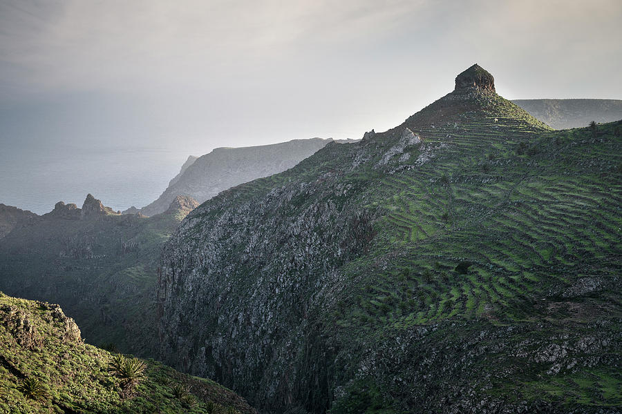Prominent Rock Formation And Trails In The Mountaineous Landscape Around National Park Parque Nacional De Garajonay, La Gomera, Canary Islands, Spain Photograph by Gnther Bayerl