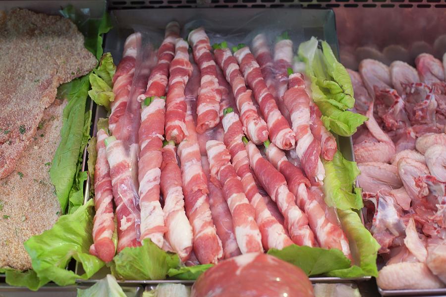 Prosciutto Wrapped Asparagus In A Display Case At A Market In Palermo, Sicily Photograph by Poplis, Paul
