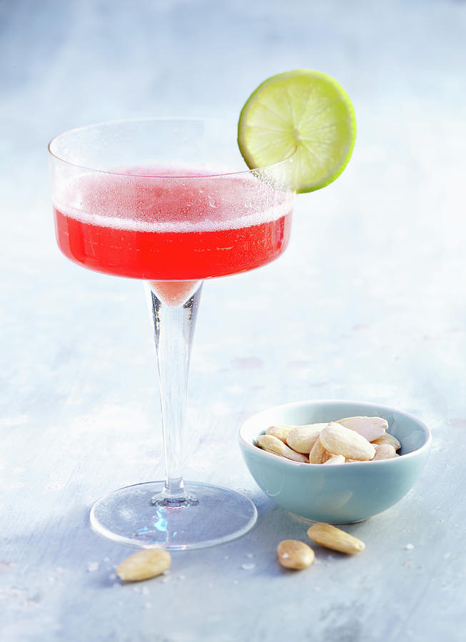 Prosecco Campari Aperitif Served With Salted Almonds Photograph by Teubner Foodfoto