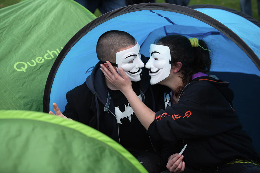 Protestors From Occupy London Celebrate Photograph by Oli Scarff