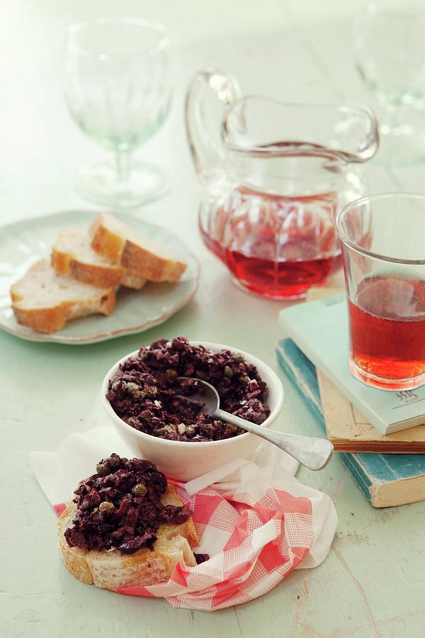 Provenal Tapenade With Black Olives And Capers Served With White Bread And Rose Wine Photograph by Ulrika Ekblom