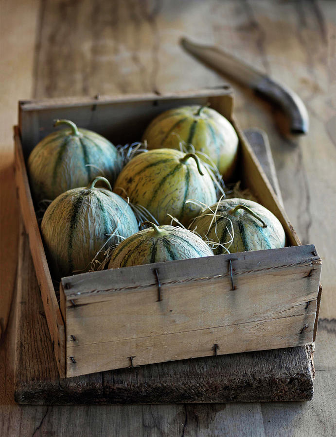 Provence Cantaloupe Melons In Box With Knife Photograph by Michael Paul
