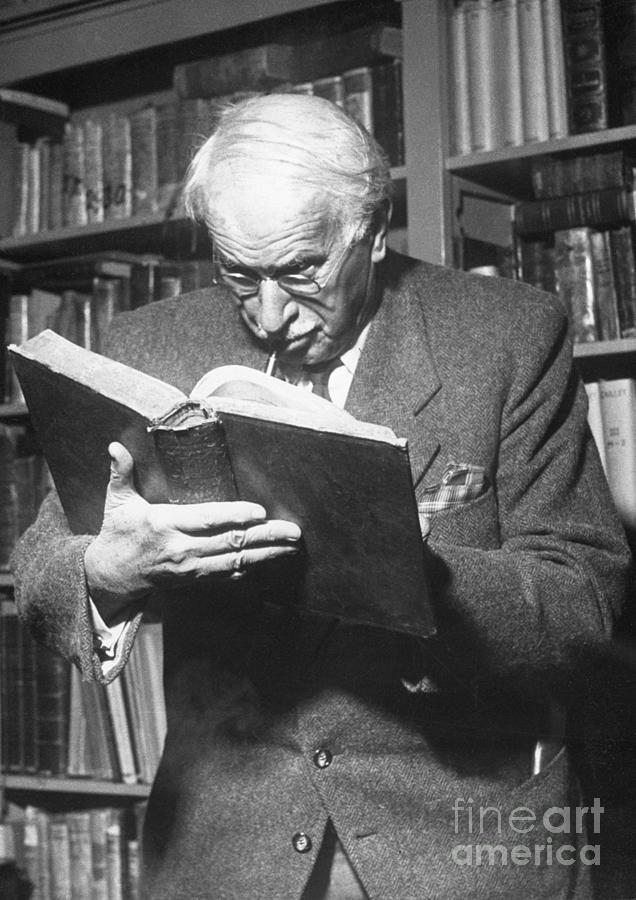 Psychiatrist Carl Jung Reading Photograph by Bettmann