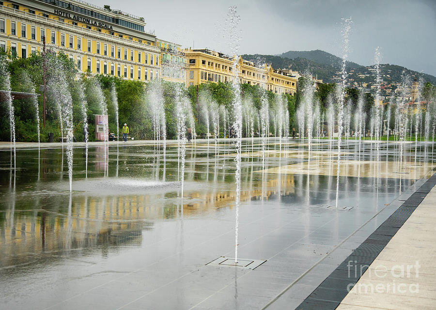 Public fountain water jets at Place Massena, Nice, France Photograph by Wayne Moran